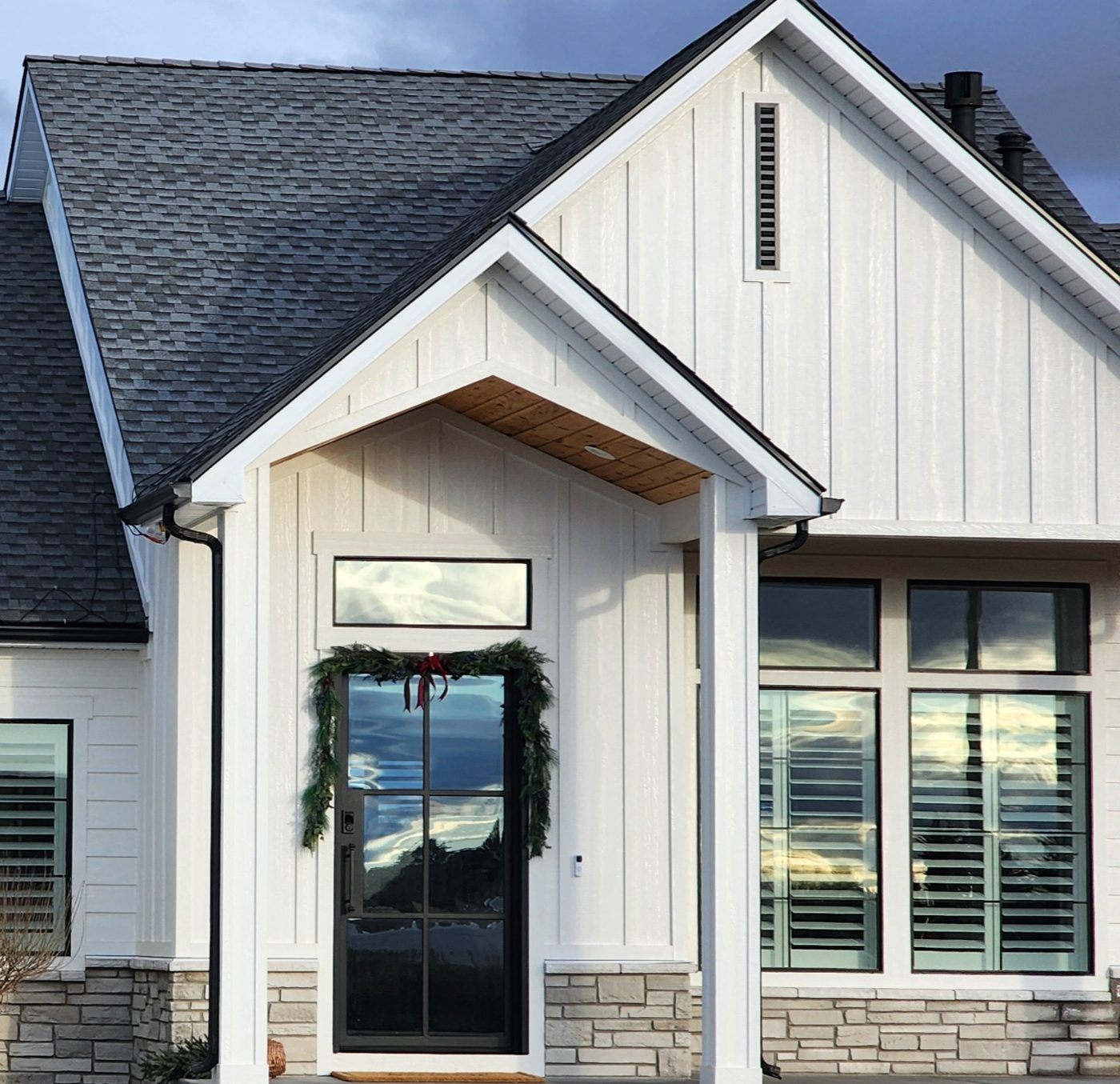 Eye-level view of a house exterior featuring a decorative gable vent