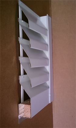 Cross section of an aluminum louver, 1-1/2 inch depth, with a perimeter wood frame